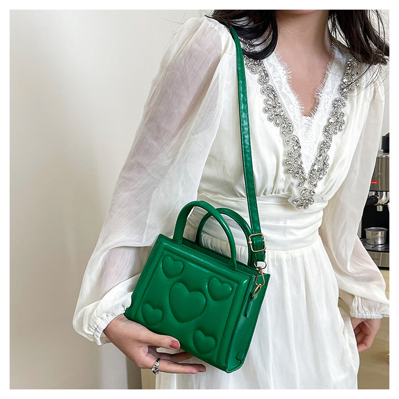 1pc Women’s Stylish Solid Color Handbag with Detachable Strap – Heart Pattern Design, Perfect for Valentine’s Day Gift, Available in Magenta, White, Black, Green, Yellow